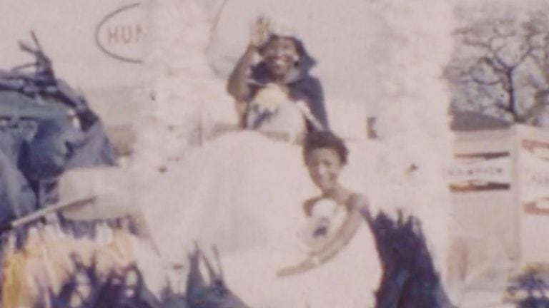 Photo - Lorene Barnes, Miss JCC 1958-59, atop float